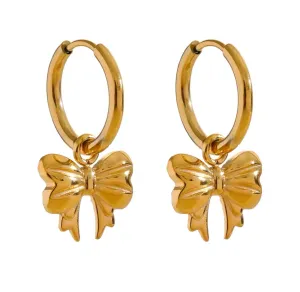 Gold Bow Huggie Hoops by Lauren Kenzie