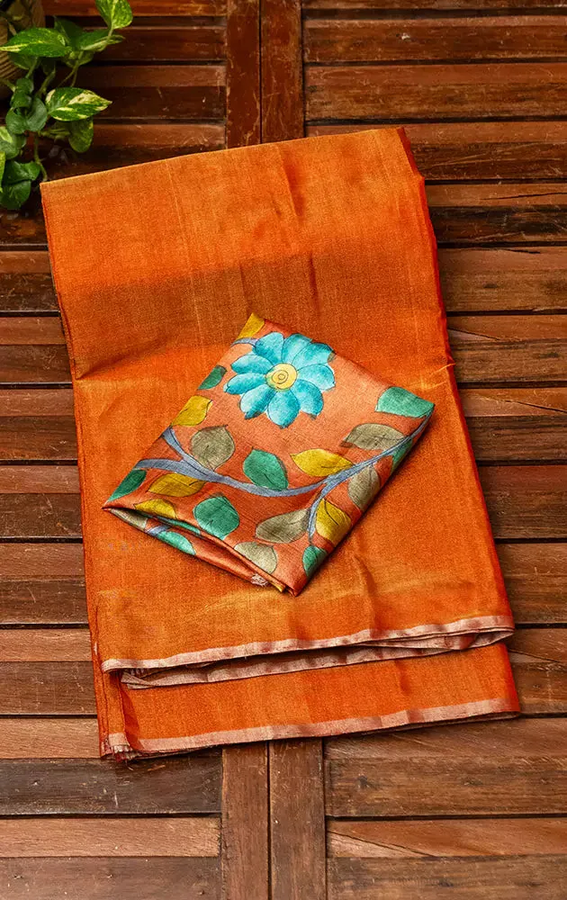 Orange chanderi tissue silk saree with kalamkari blouse