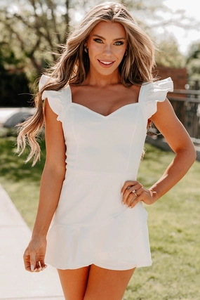 Spotted In Soho Ruffled Denim Romper (White) Spotted In Soho Ruffled Denim Romper (White)